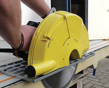 handheld dry cut circular saw cutting side view