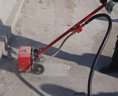 11-head air-powered concrete floor scabbler application