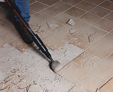Lifting tile with long-reach scraper