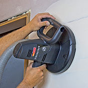 Hand-held drywall sander