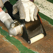 Hand-held concrete scarifier rotopeen