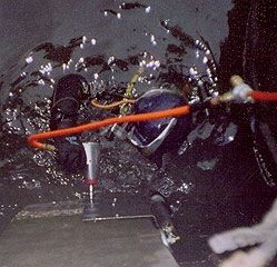 Diver Secures Steel Plates