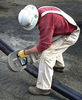 Portable Electric Band Saw "CUTS IT" in High Voltage Cable Installations
