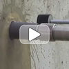 Diamond Core Drill making holes in concrete with water-cooled bits