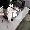 Diamond core drill making small holes in tile with water-cooled bits