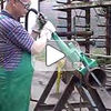 Air hacksaw cutting steel pipe