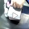 Removing scratches from flat stainless steel plate